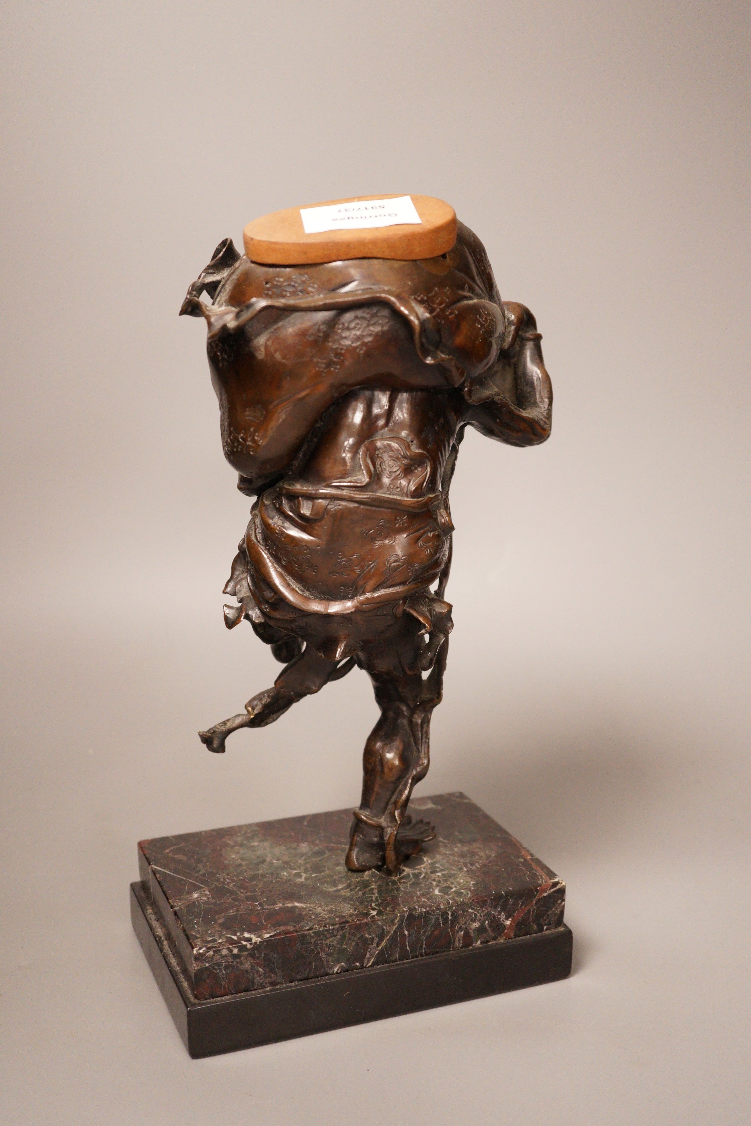 A Meiji period Japanese bronze figural censer, study of a demon, 31cm